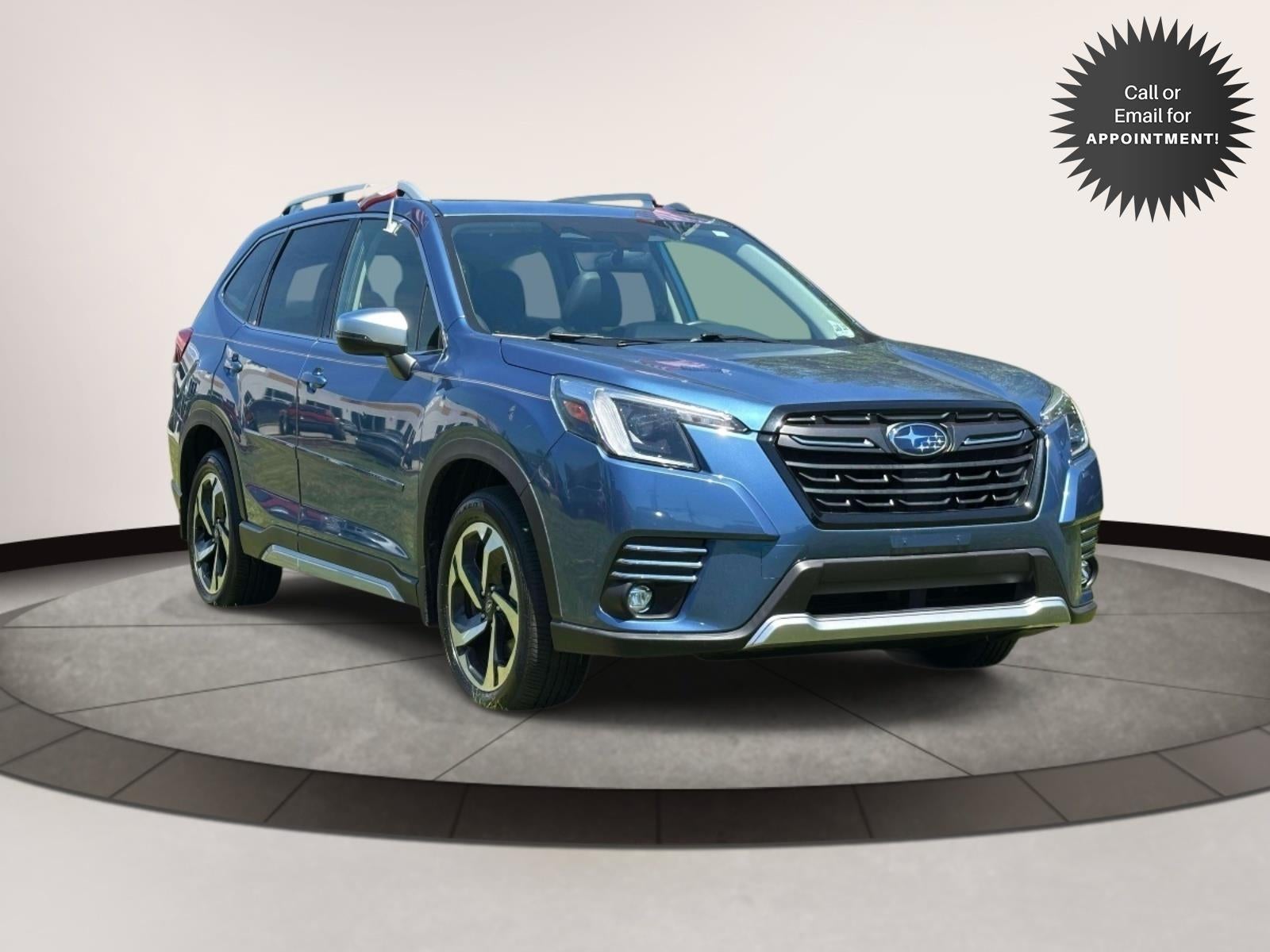 2023 Subaru Forester Touring CVT in Blue — front three-quarter view