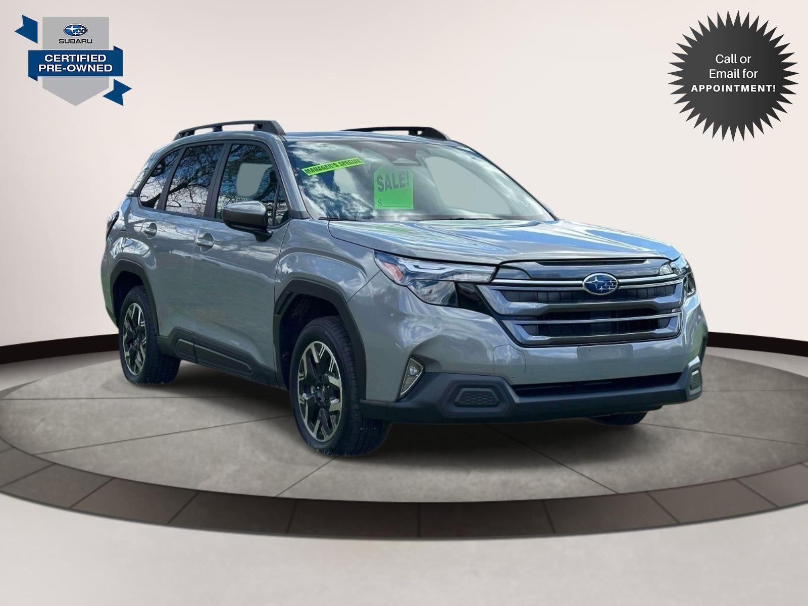 2025 Subaru Forester Premium AWD in River Rock Pearl — front three-quarter view