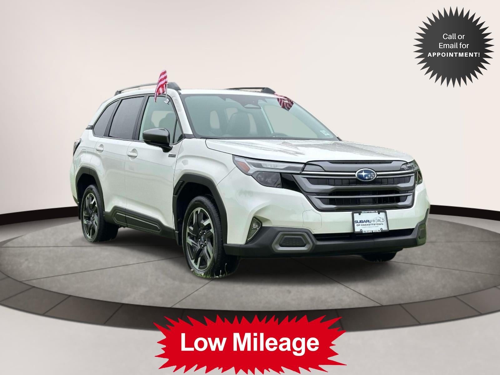 2025 Subaru Forester Limited Hybrid AWD in White — front three-quarter view