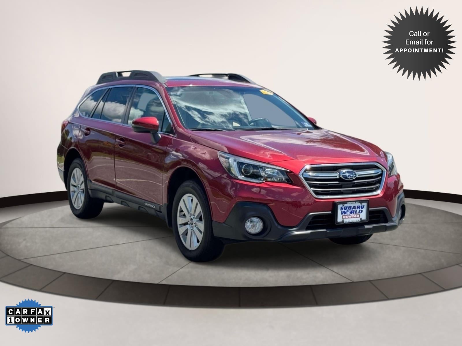 2019 Subaru Outback 2.5i Premium in Red — front three-quarter view
