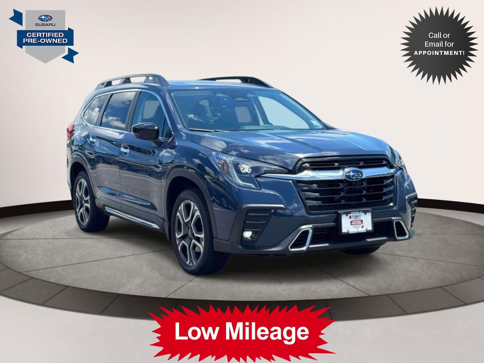2025 Subaru Ascent Touring 7-Passenger in Blue — front three-quarter view