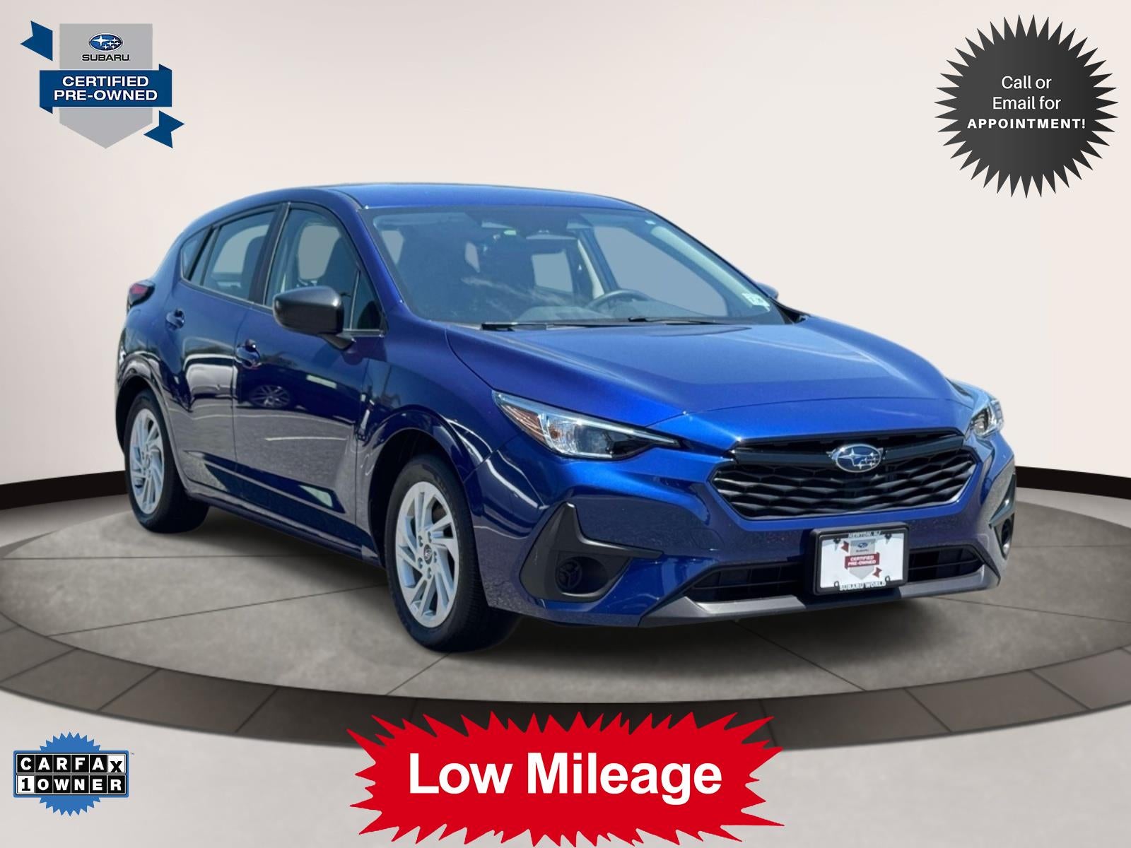 2024 Subaru Impreza AWD in Blue — front three-quarter view